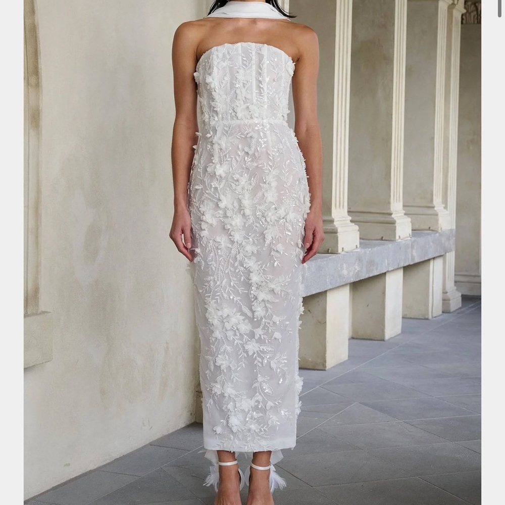 Brand new never worn still with the tags white dress